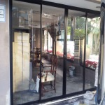 ประตูบานสวิง - ร้านพนม อลูมิเนียม